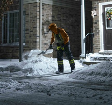 Cleared apartment building entrance in winter